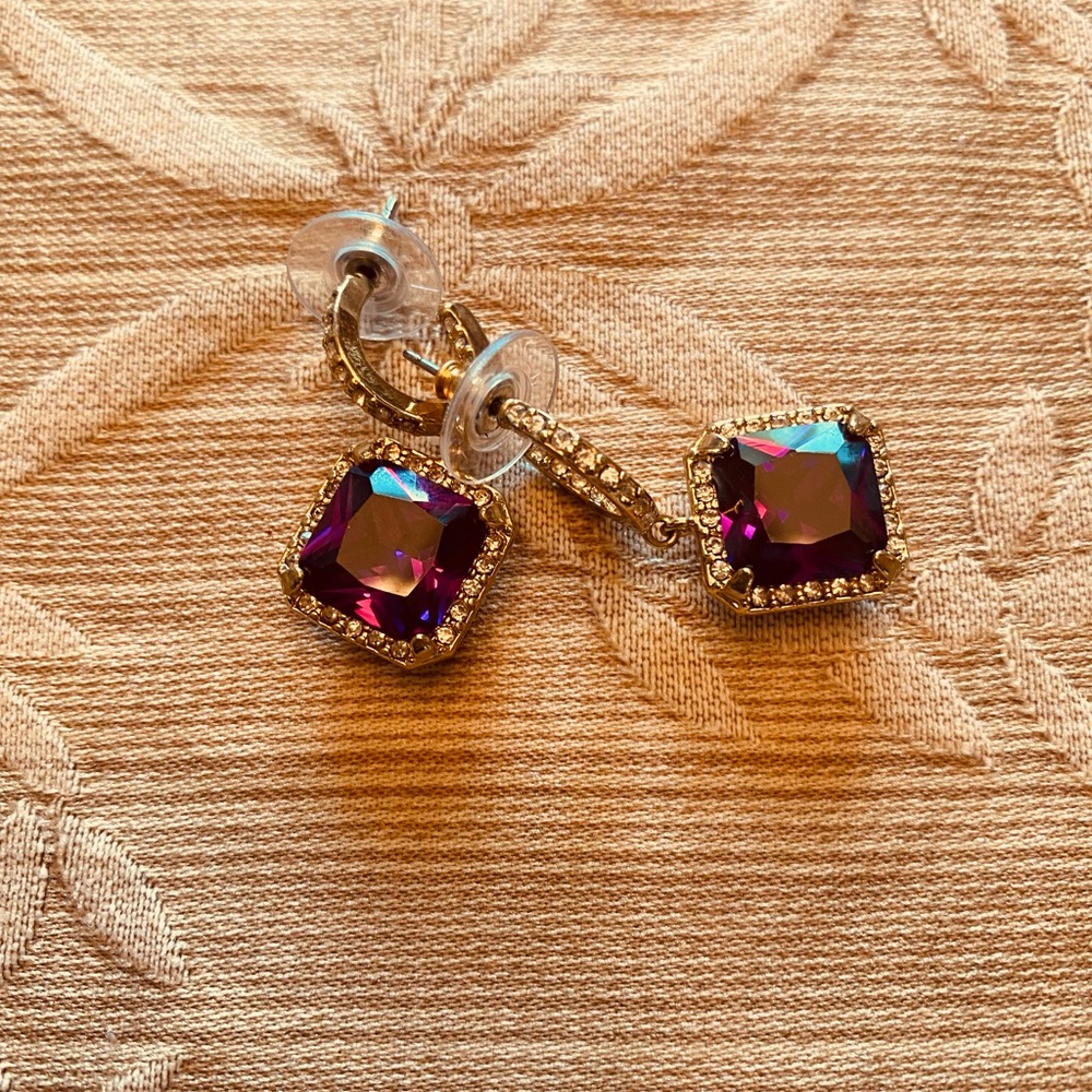Faux amethyst earrings with crystal accents. Posts